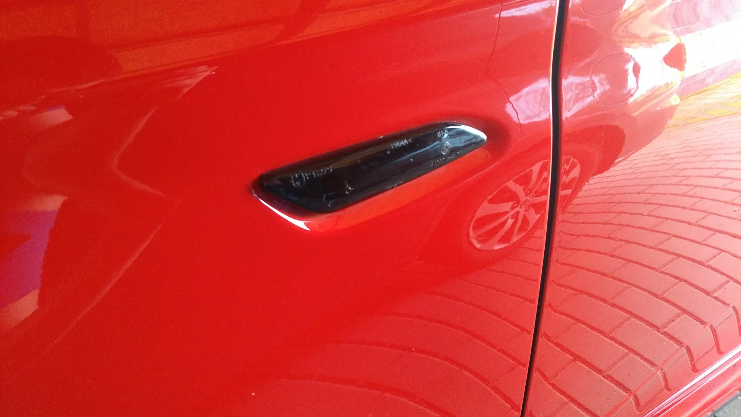 Schwarze Seitenblinker