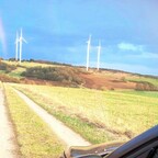 ...und Tipo fuhr zum Regenbogen bei den großen Windmühlen.